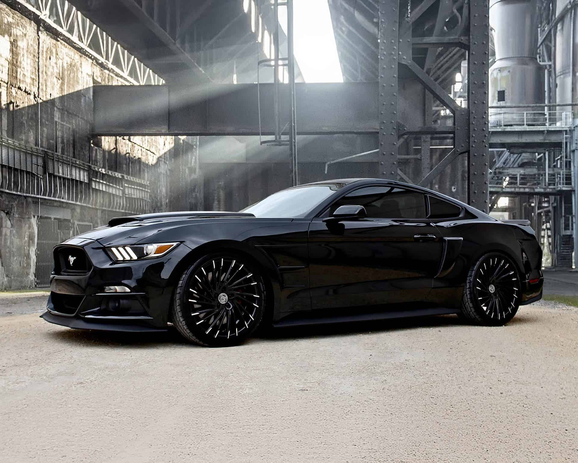 Lexani custom black Wraith with sleek design and premium wheels.