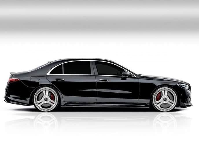 Black luxury sedan with custom Lexani wheels and sleek design.