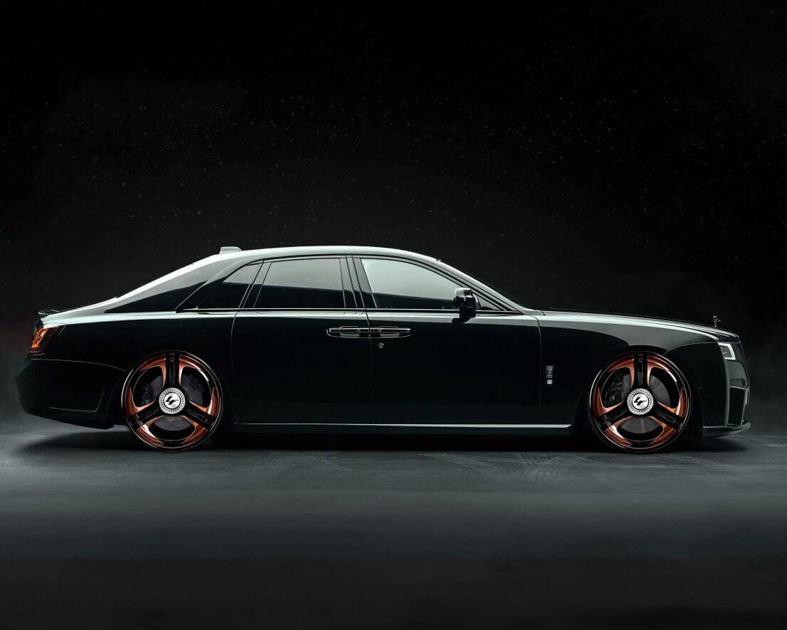 Luxani LF-Tressa luxury vehicle with custom black and copper wheels, showcasing elegance and high-en.