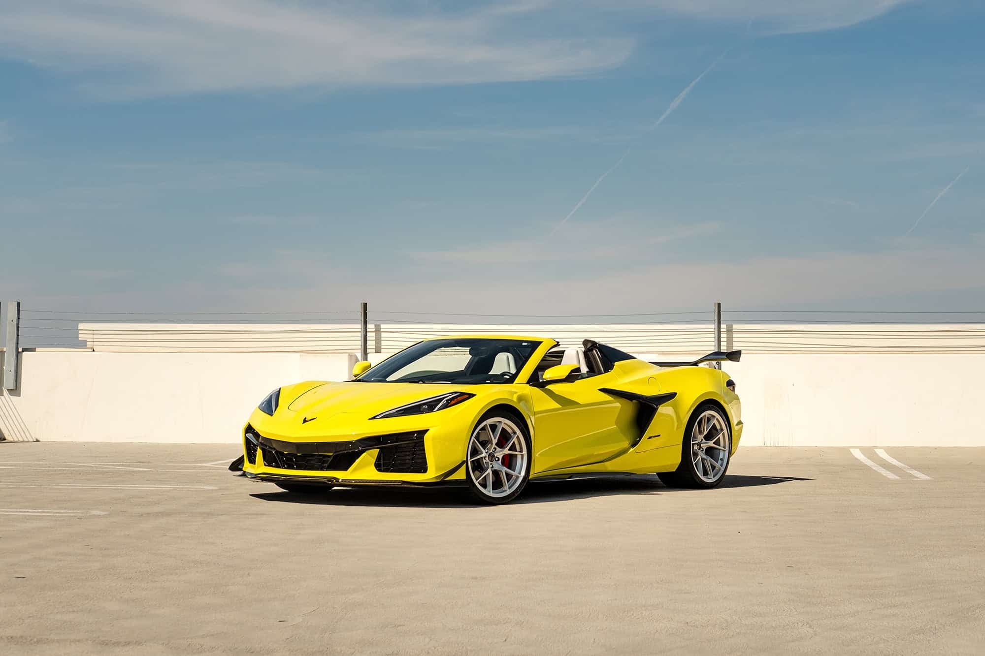 High-performance yellow sports car with custom modifications, perfect for luxury car enthusiasts.