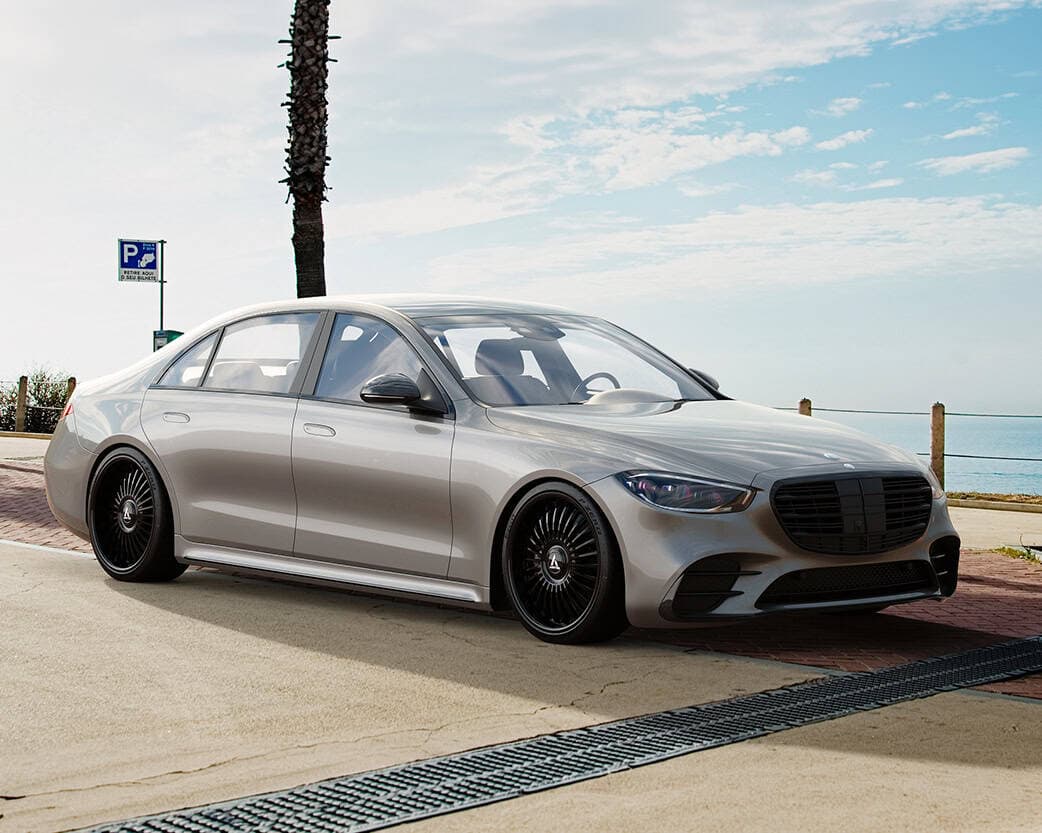 Luxury car with custom Lexani wheels and sleek design.
