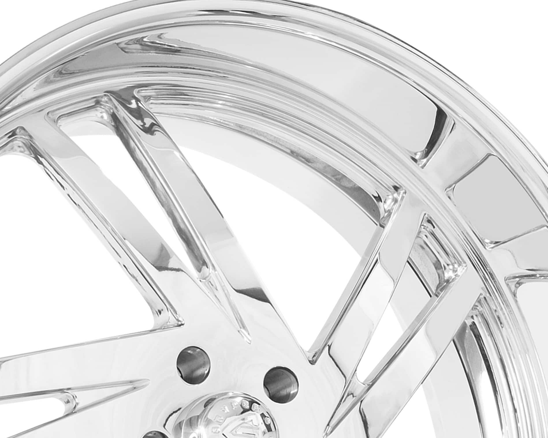 Close-up of a luxury Lexani Torino alloy wheel with intricate design.